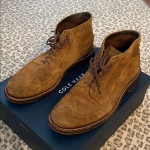 Cole Haan suede wingtip boots.
